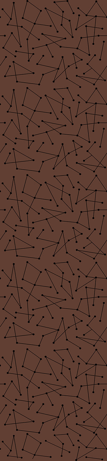 A roll of chocolate brown wallpaper with a geometric dot pattern from drop it MODERN.