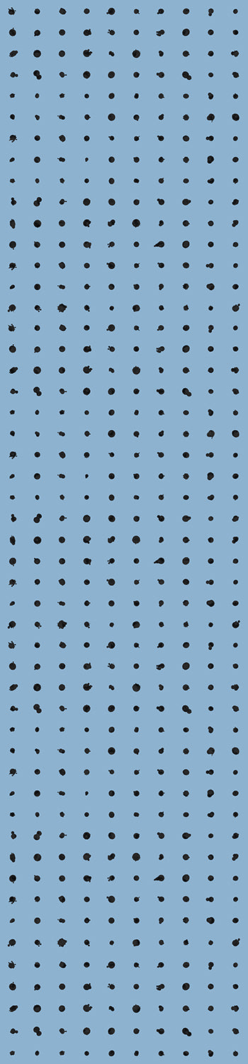 A roll of dotted line wallpaper in powder blue color with a geometric pattern from drop it MODERN.