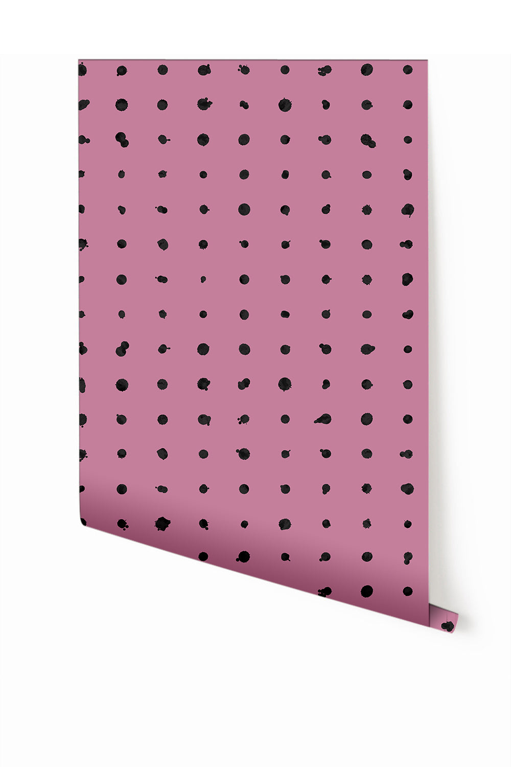 A roll of dotted line wallpaper in purple color with black dots pattern from drop it MODERN.