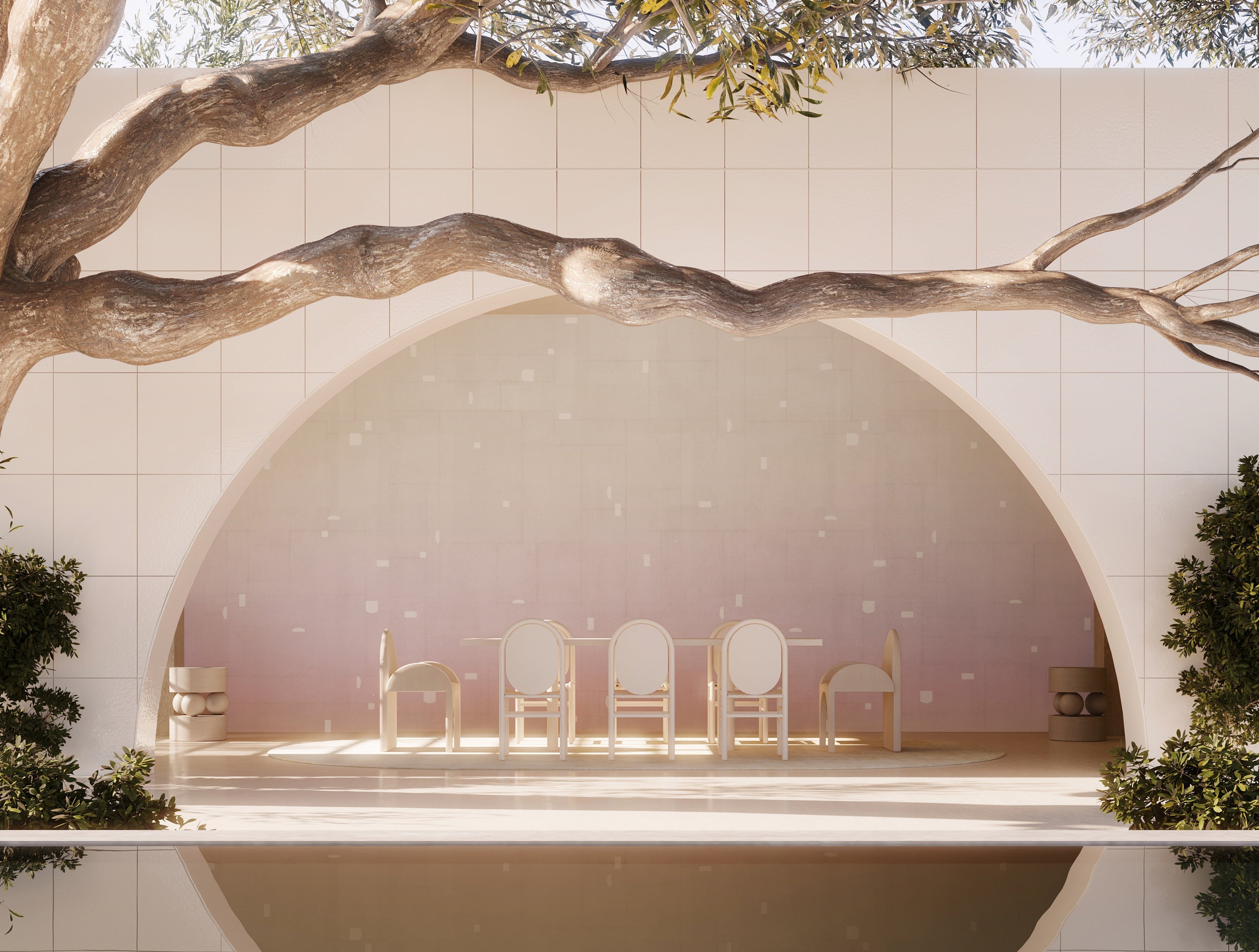 Dining area with chairs and a table framed by tree branches and a circular wall from drop it MODERN.