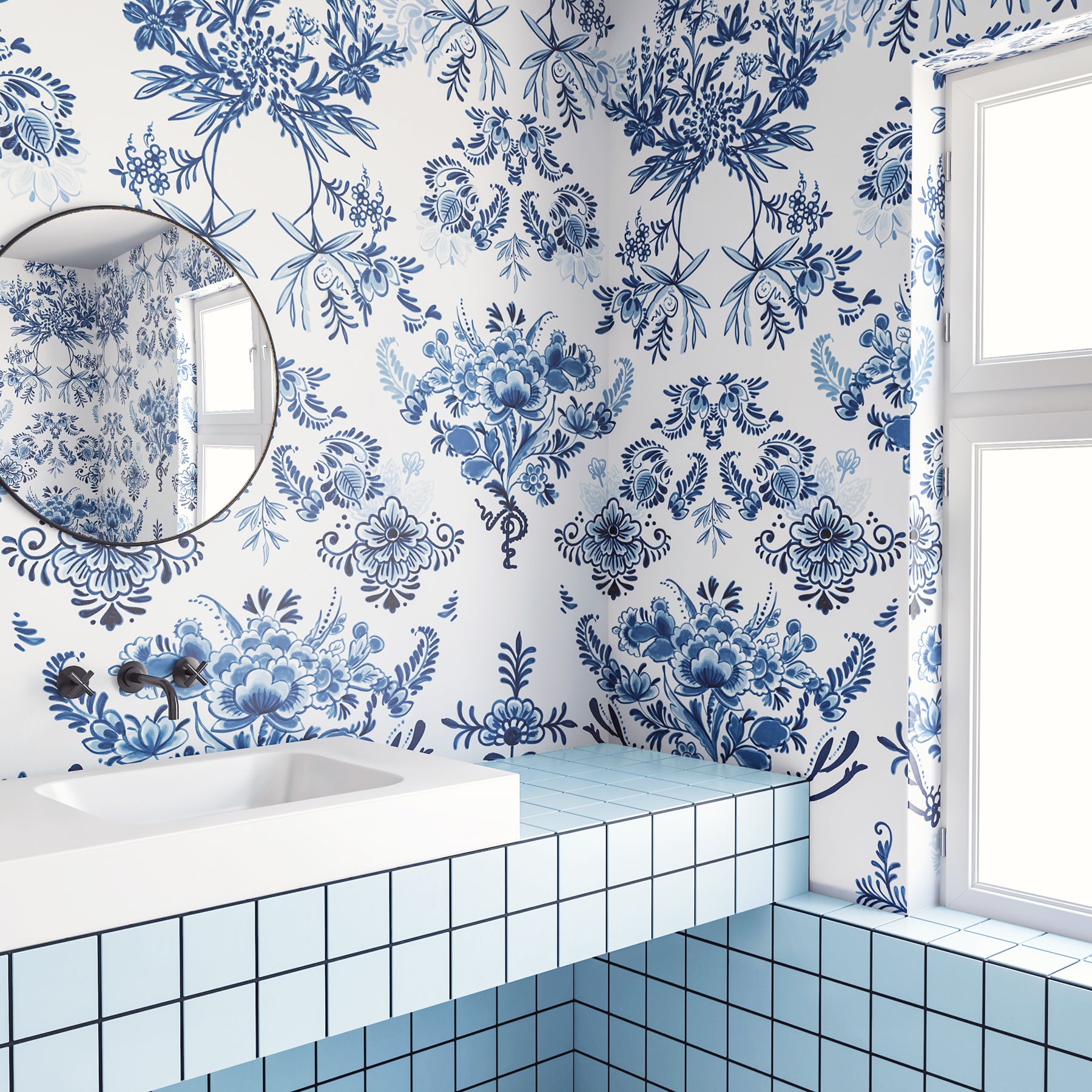 The Delft© Mural Wallpaper in Blue in a bathroom from drop it MODERN.