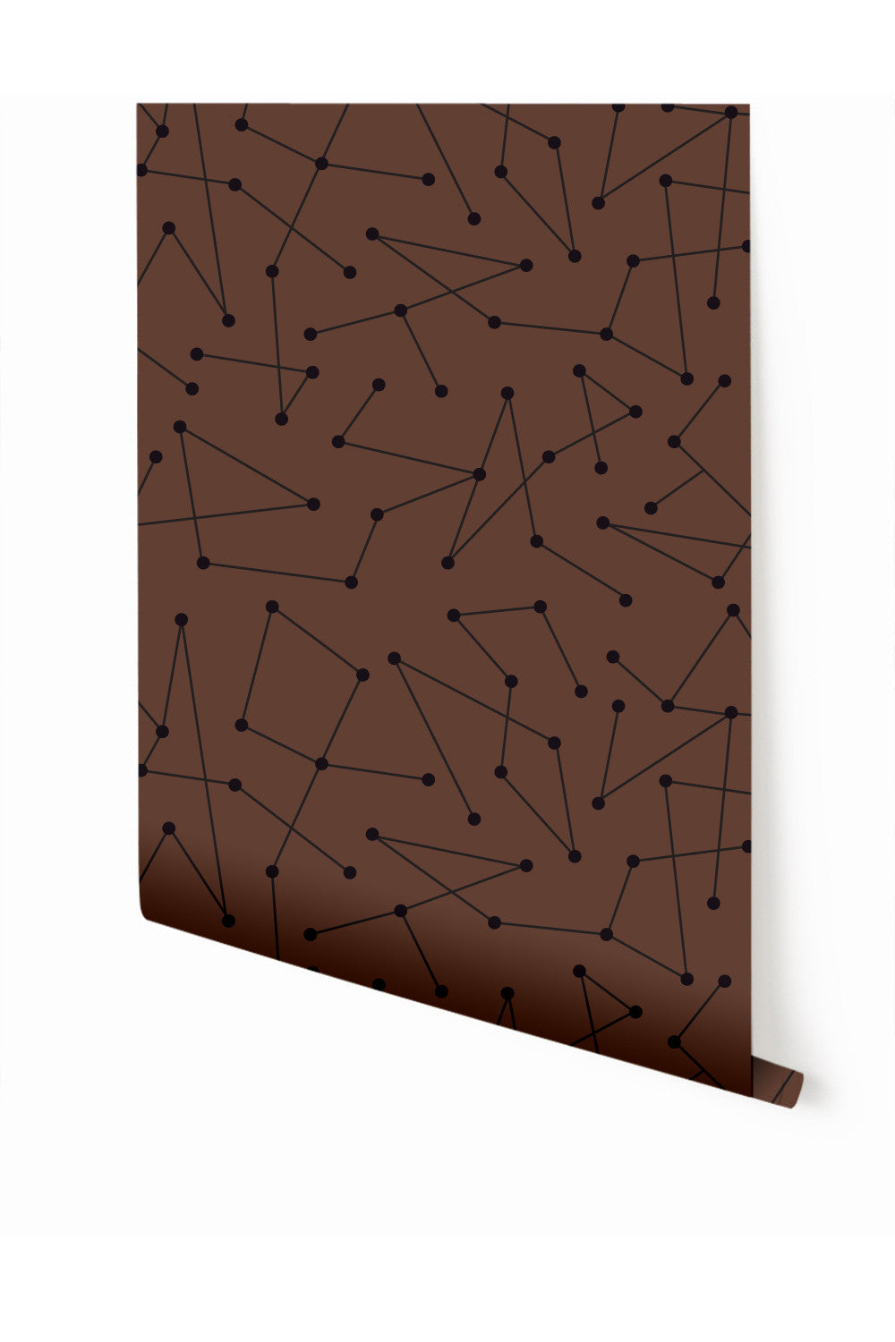 A roll of chocolate brown wallpaper with a geometric dot pattern from drop it MODERN.