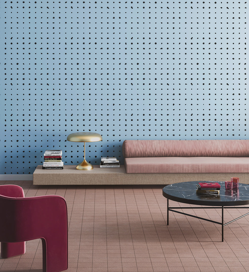 The Dotted Line© Wallpaper in Powder Blue in a living room from drop it MODERN.