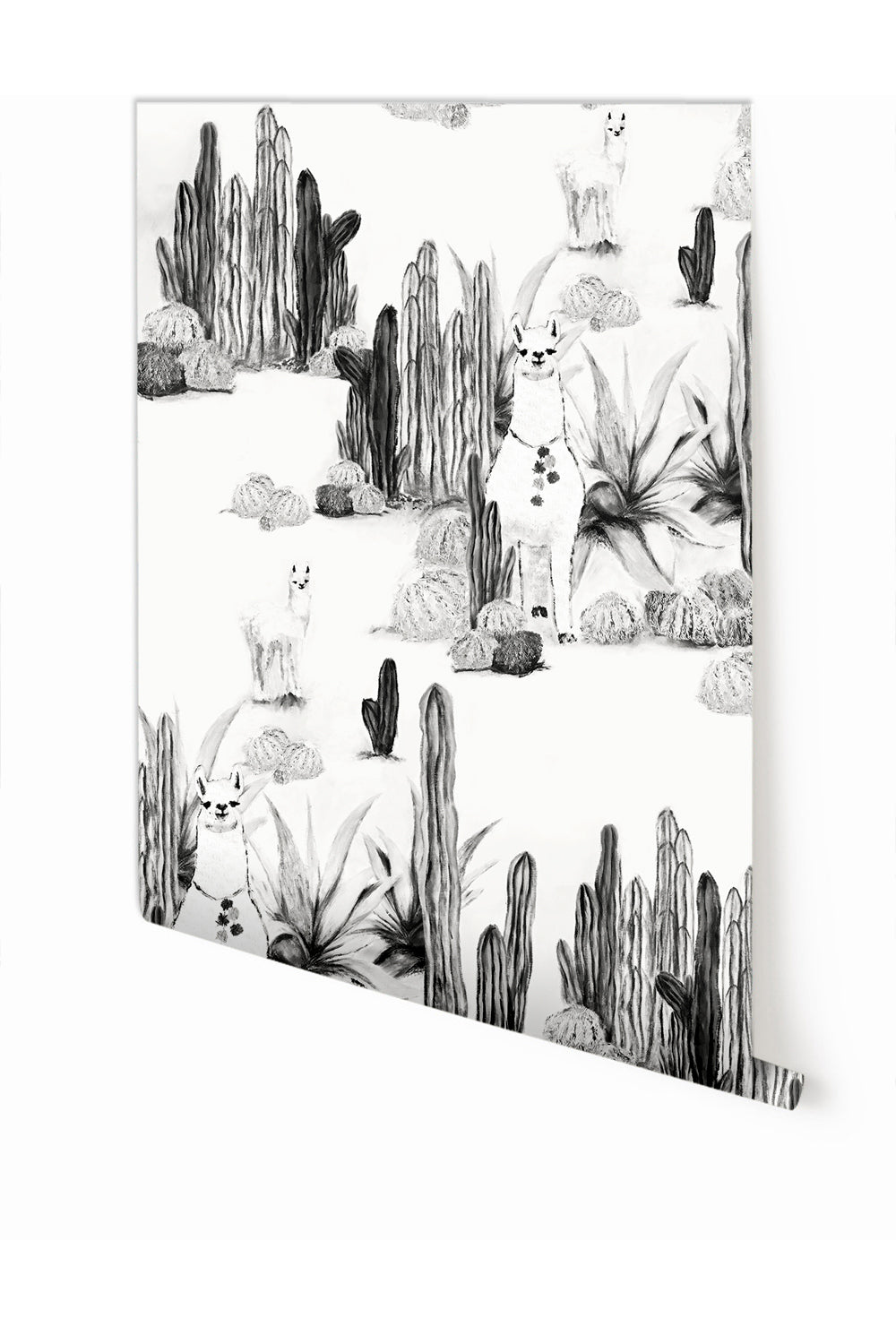 A roll of black and white wallpaper featuring a pattern with cacti and desert elements from drop it MODERN.