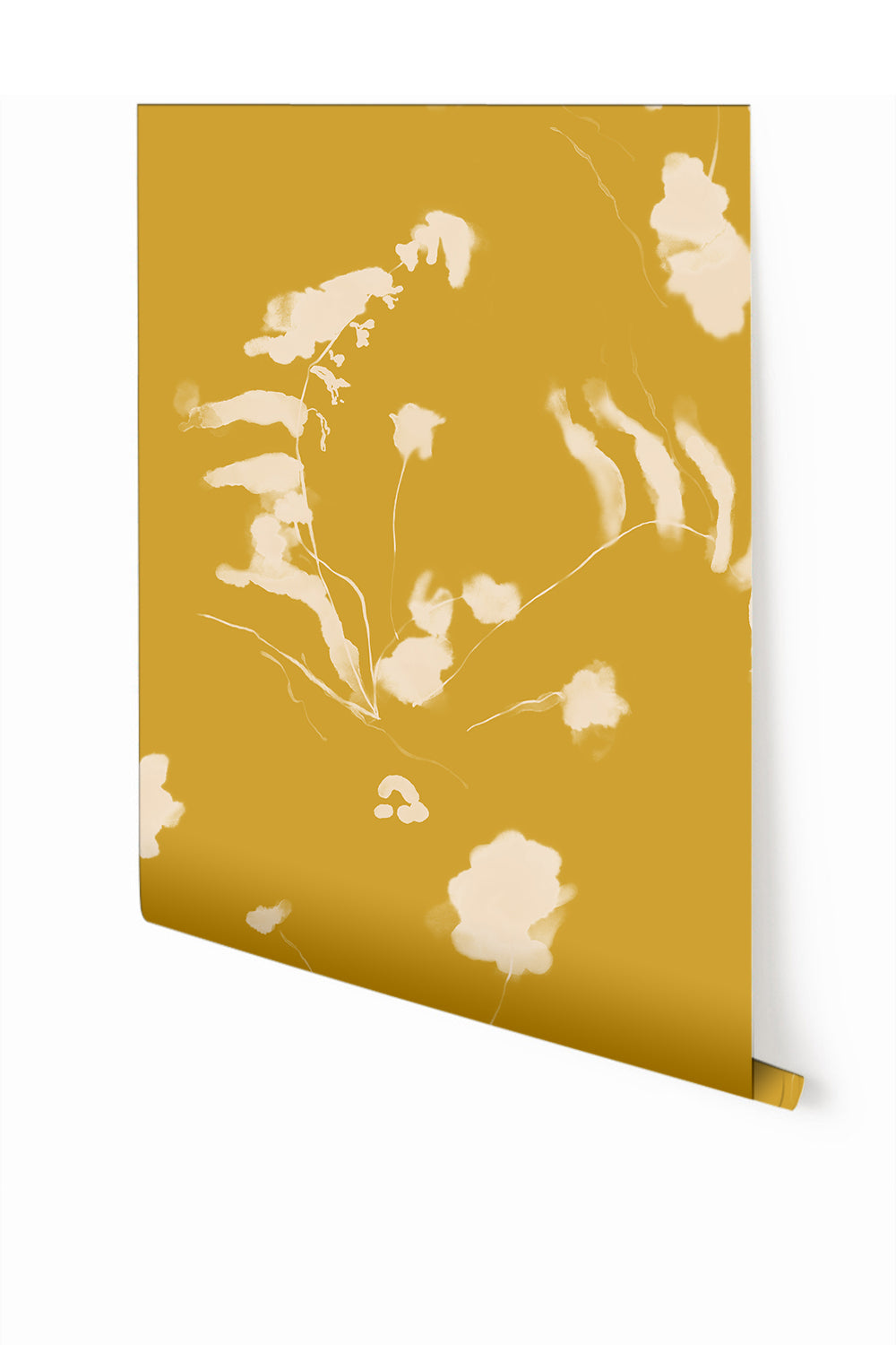 A roll of mustard yellow wallpaper with a floral pattern from drop it MODERN.